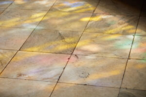 light from the Chapel's stained glass on the stone floor