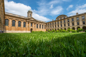 Front Quad with green grass and blue skies