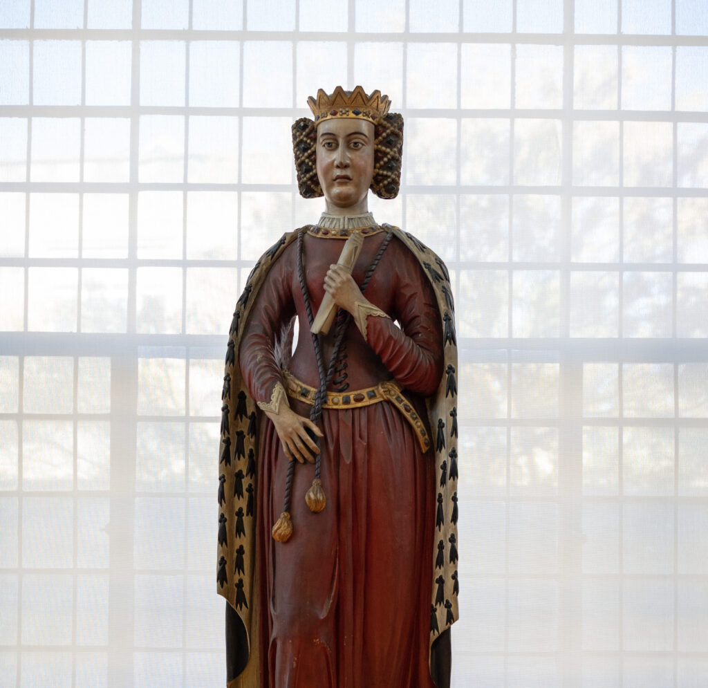 Queen Philippa statue in the Upper Library