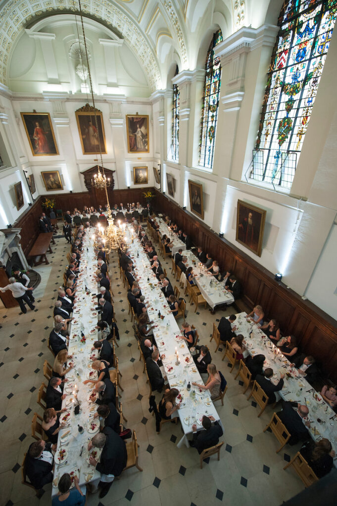 full dining hall at an Old Member event.