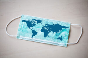 surgical mask with map of the world printed on it