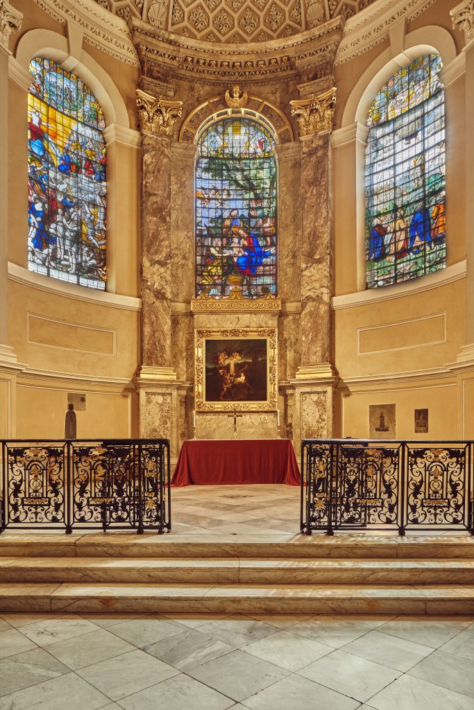 Chapel interior showing the altar and stained glass windows