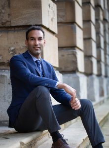 Farsan Ghassim on the steps of Front Quad