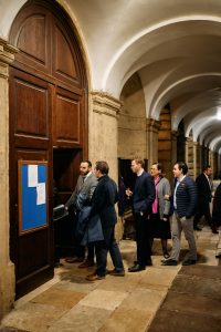 people in the cloister going into the Hall