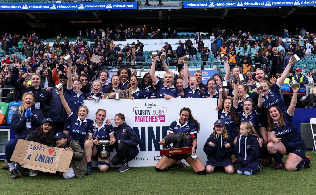 Varsity Rugby 2023: women's team celebrating the win.