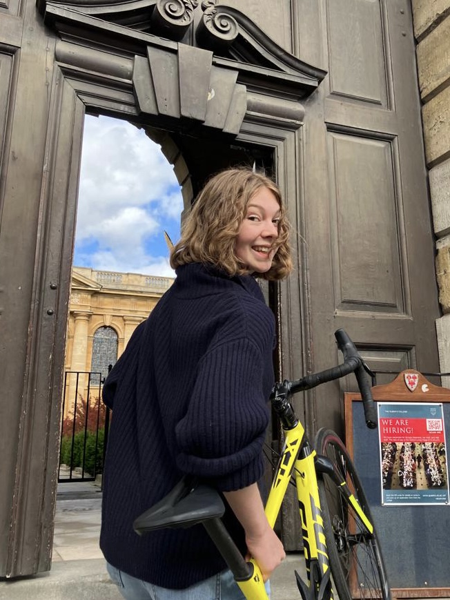 Bryony arriving at the main door to Queen's on Oxford's High Street