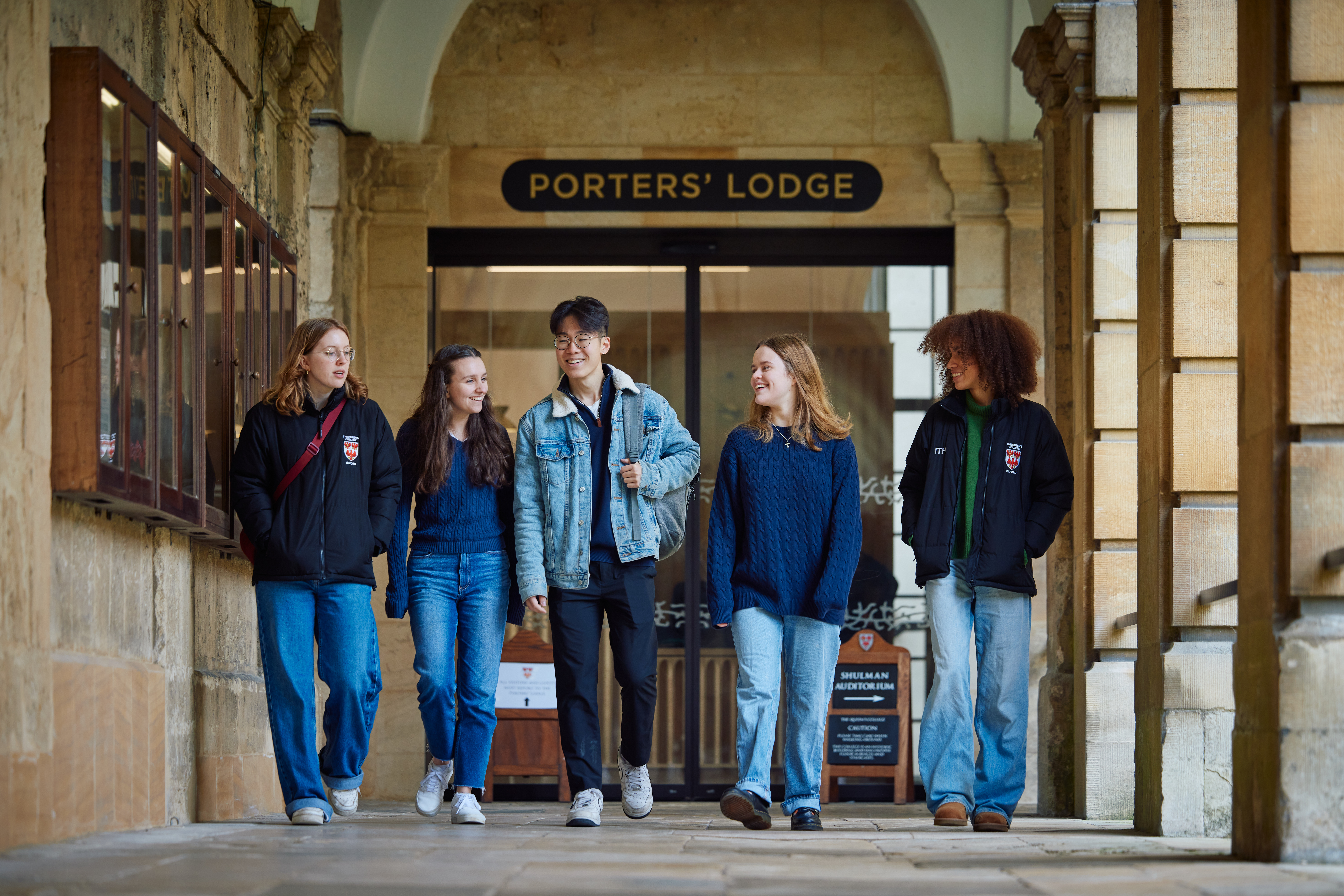 students walking in the cloister