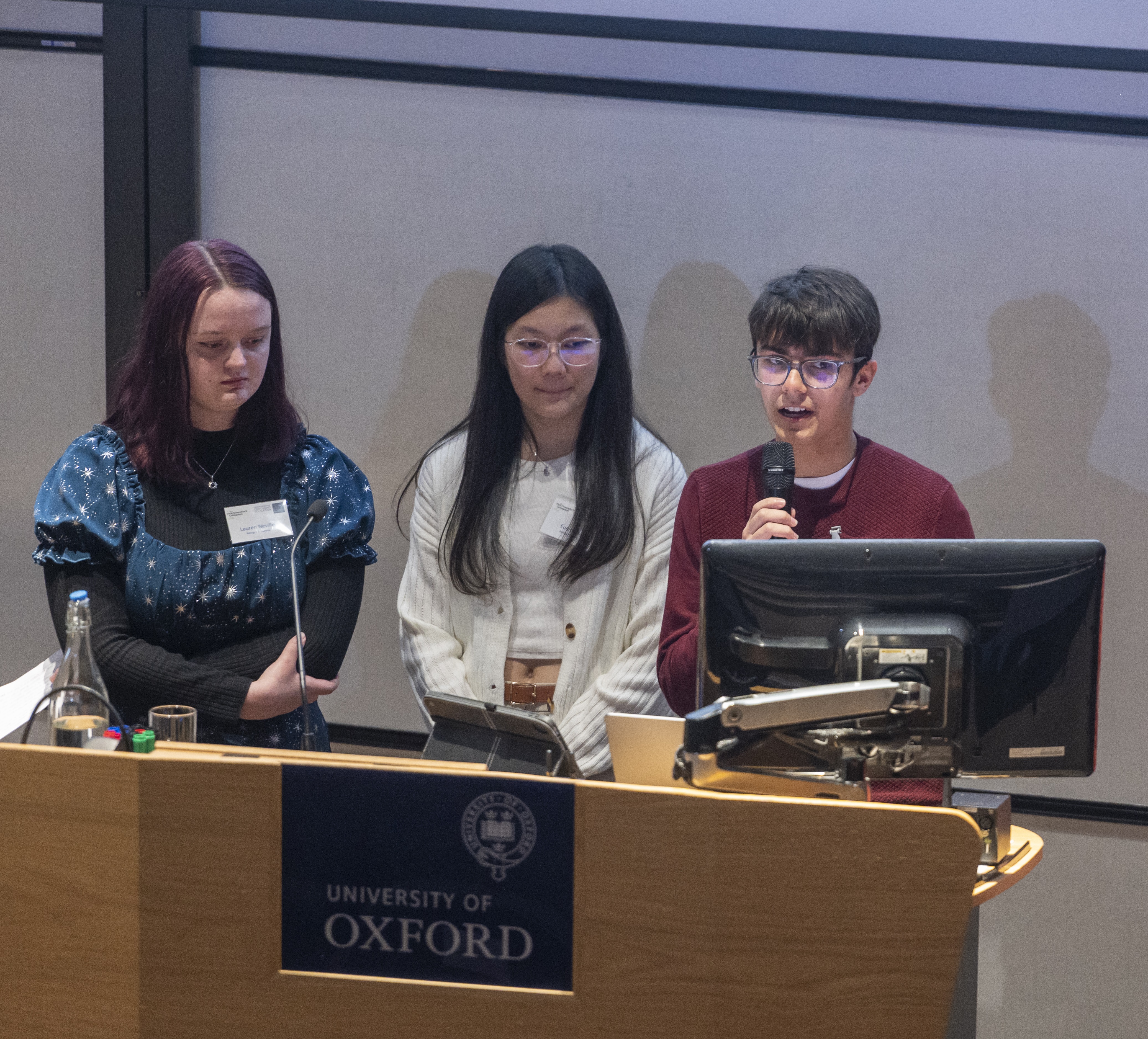 Eunice Ho and her team presenting at the VC's colloqiuim