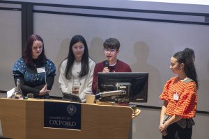 Eunice Ho and her team presenting at the VC's colloqiuim