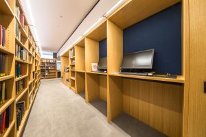 standing desks shown opposite book cases