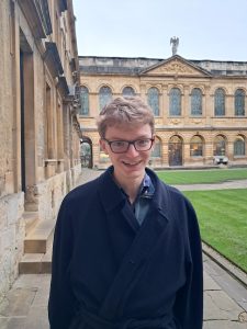profile photo of Sam Troy in the Back Quad at Queen's College