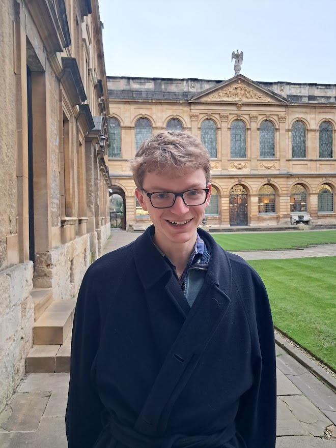 profile photo of Sam Troy in the Back Quad at Queen's College