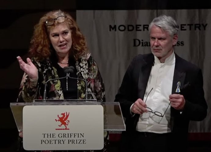 Karen Leeder and Durs Grunbein speaking at the Griffin Poetry Prize reading after they are announced as the winners