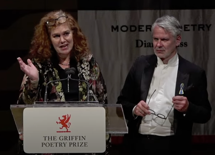 Karen Leeder and Durs Grunbein speaking at the Griffin Poetry Prize reading after they are announced as the winners