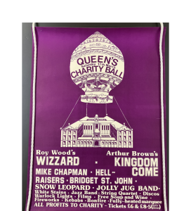 Poster for the 1973 cancelled ball. There's a purple background and a drawing of a hot air balloon tethered to the College