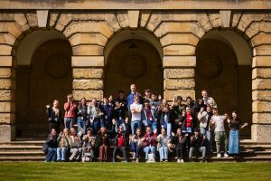 school group photographed on the steps of Front Quad