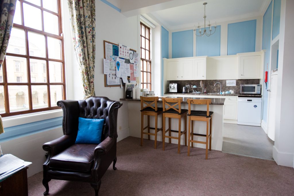 the Middle Common Room showing the kitchen and breakfast bar
