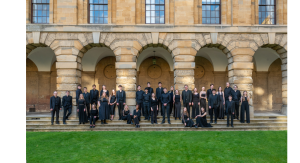 The Queen's College Choir standing on the steps of Front Quad all dressed in black.
