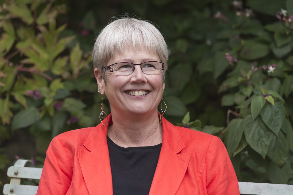 Prof Jane Langdale pictured in the College gardens