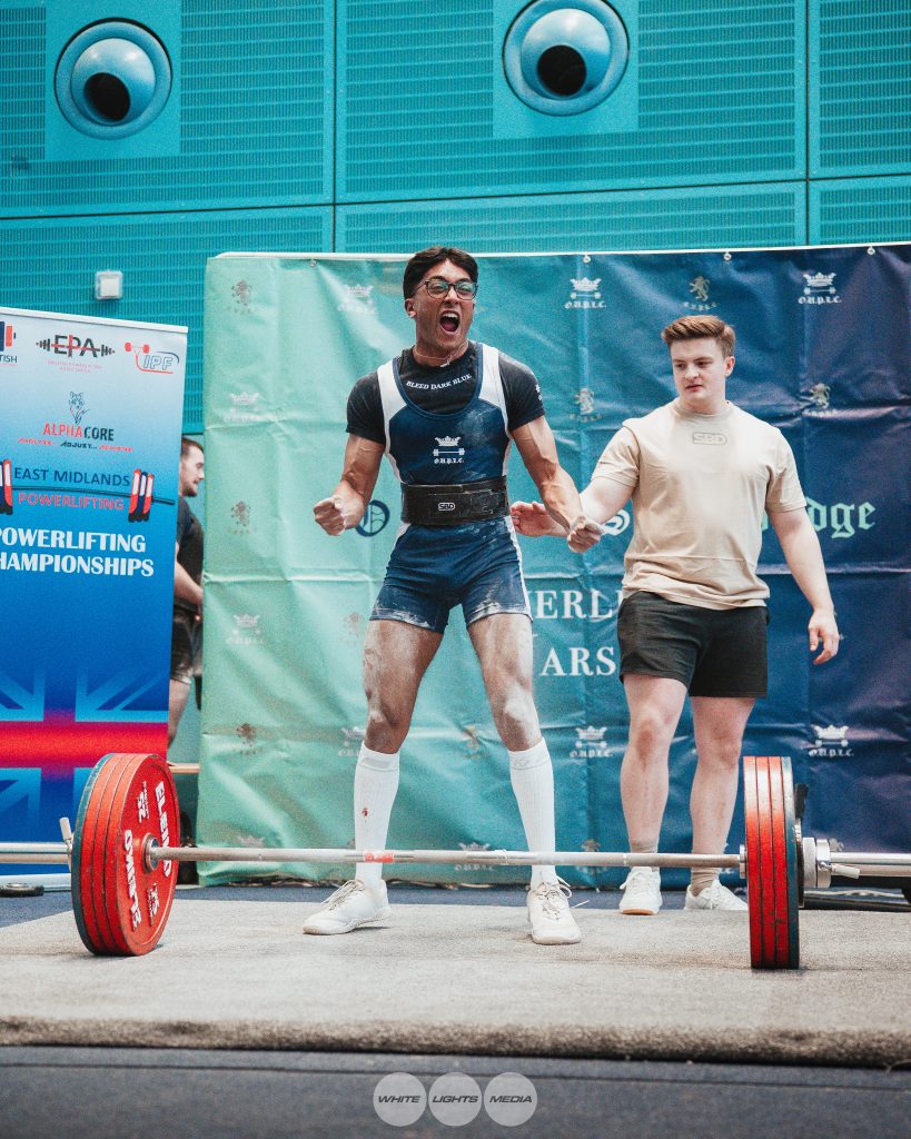 Karthik Saravanan pictured at varsity powerlifting the moment after he breaks his third record