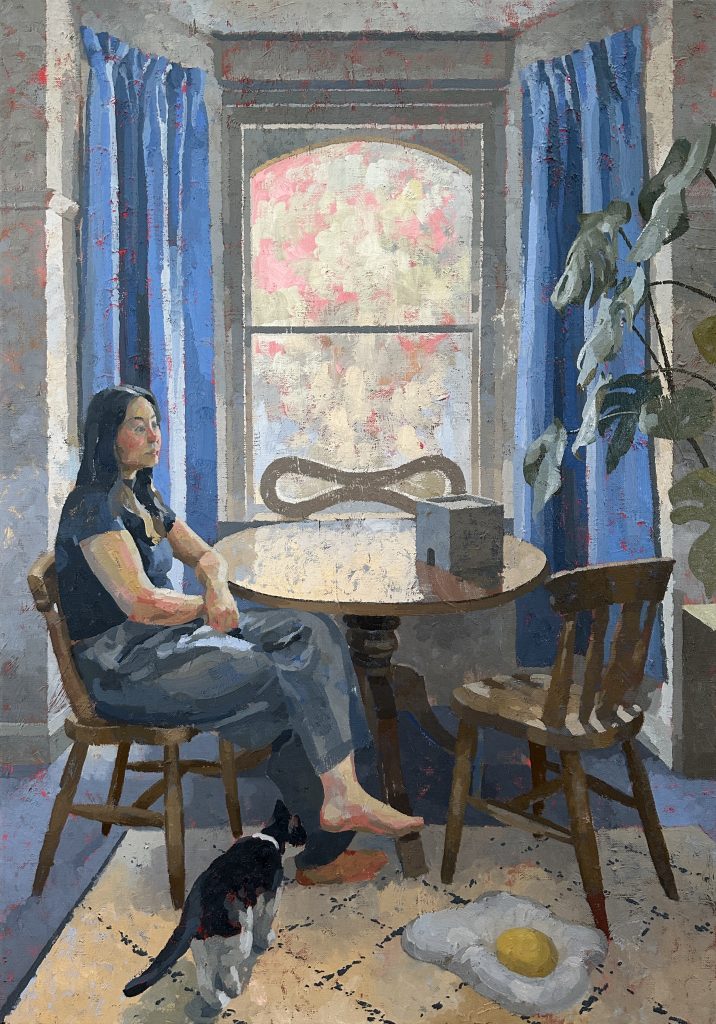 Jonathan Chan painting of a lady sitting at a table by a large window with a cat by her legs and a large fried egg on the floor