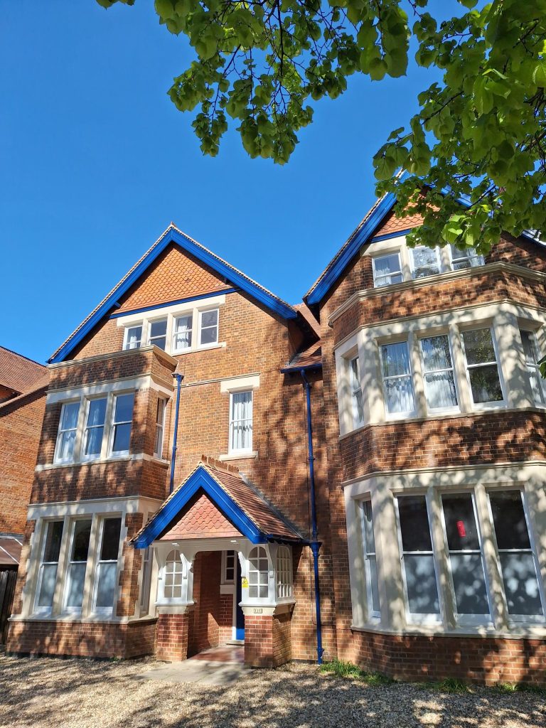 Oxley Wright exterior: a red-brick 3-storey house.