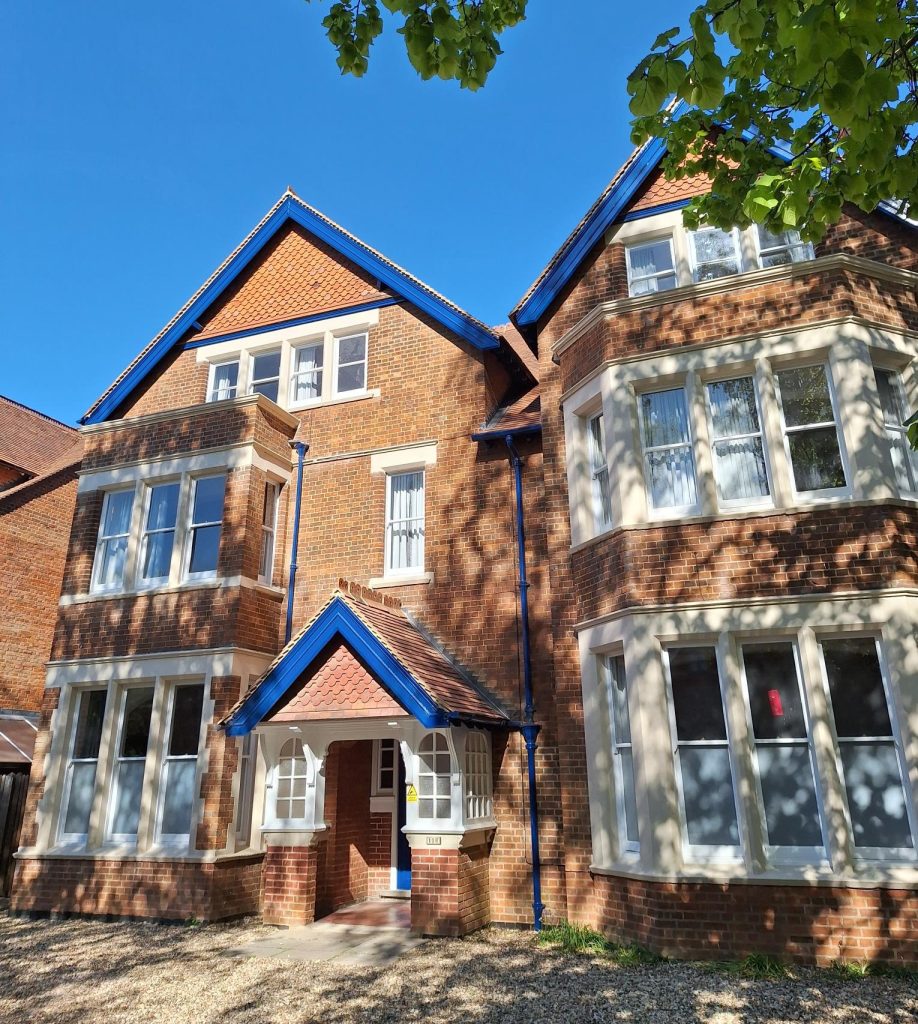 Oxley Wright exterior: a red-brick 3-storey house.