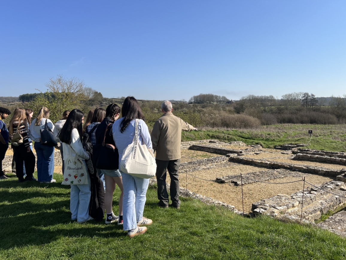 a school group on a sunny day at North Leigh Roman Villa
