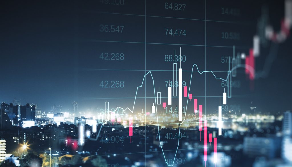 Stock chart with candlesticks overlaid on a night cityscape