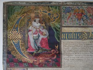 Illuminated capital from the Letters Patent of Charles I (2V26)