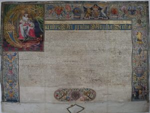 The Letters Patent of Charles I, granted to Queen's College in 1626, showing the border and illumination.