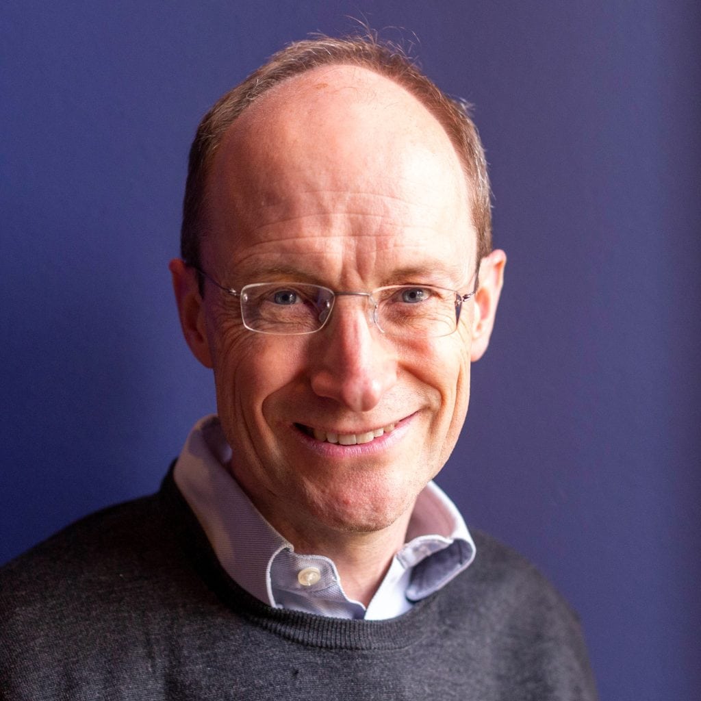 Tim Leunig headshot with blue background square