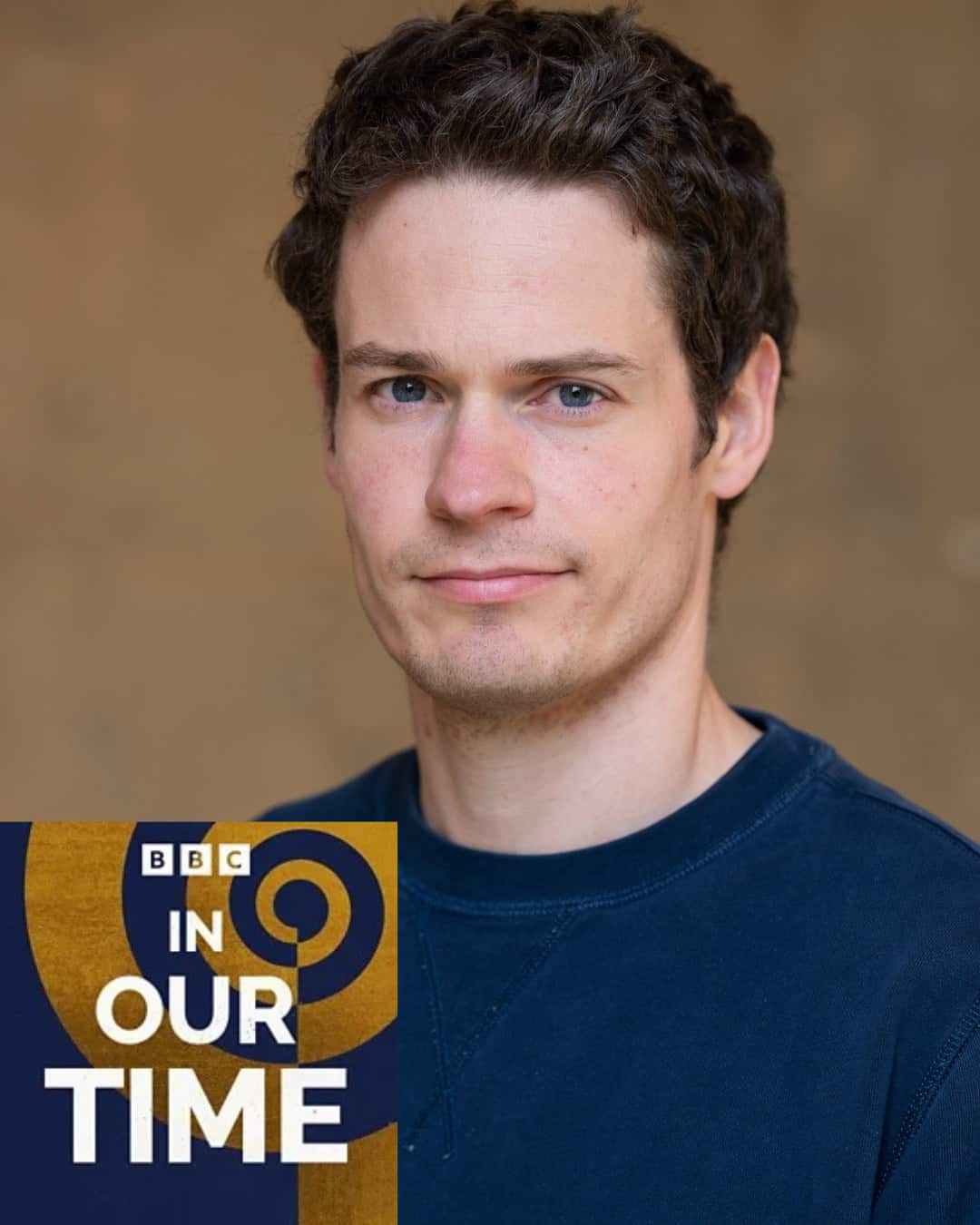 Christopher Metcalf headshot with BBC In Our Time logo with a blue background and gold abstract spiral overlaid in the bottom left corner