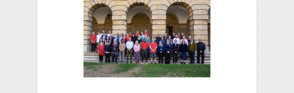 A group shot of the College staff taken in Front Quad